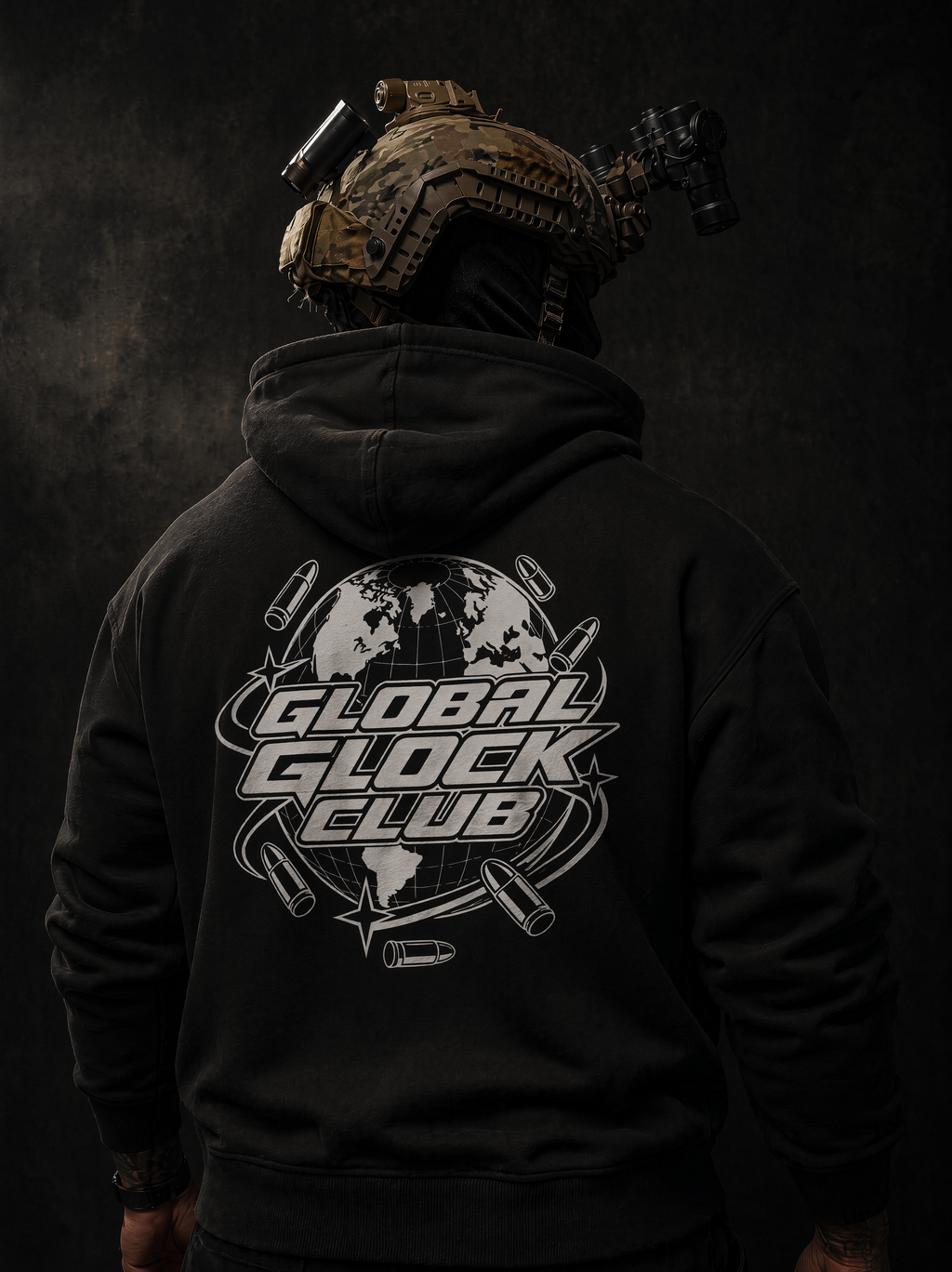 A person shown from behind wearing a black hoodie with a large white 'GLOBAL GLOCK CLUB' graphic printed on the back, styled with tactical gear and a helmet against a dark background.