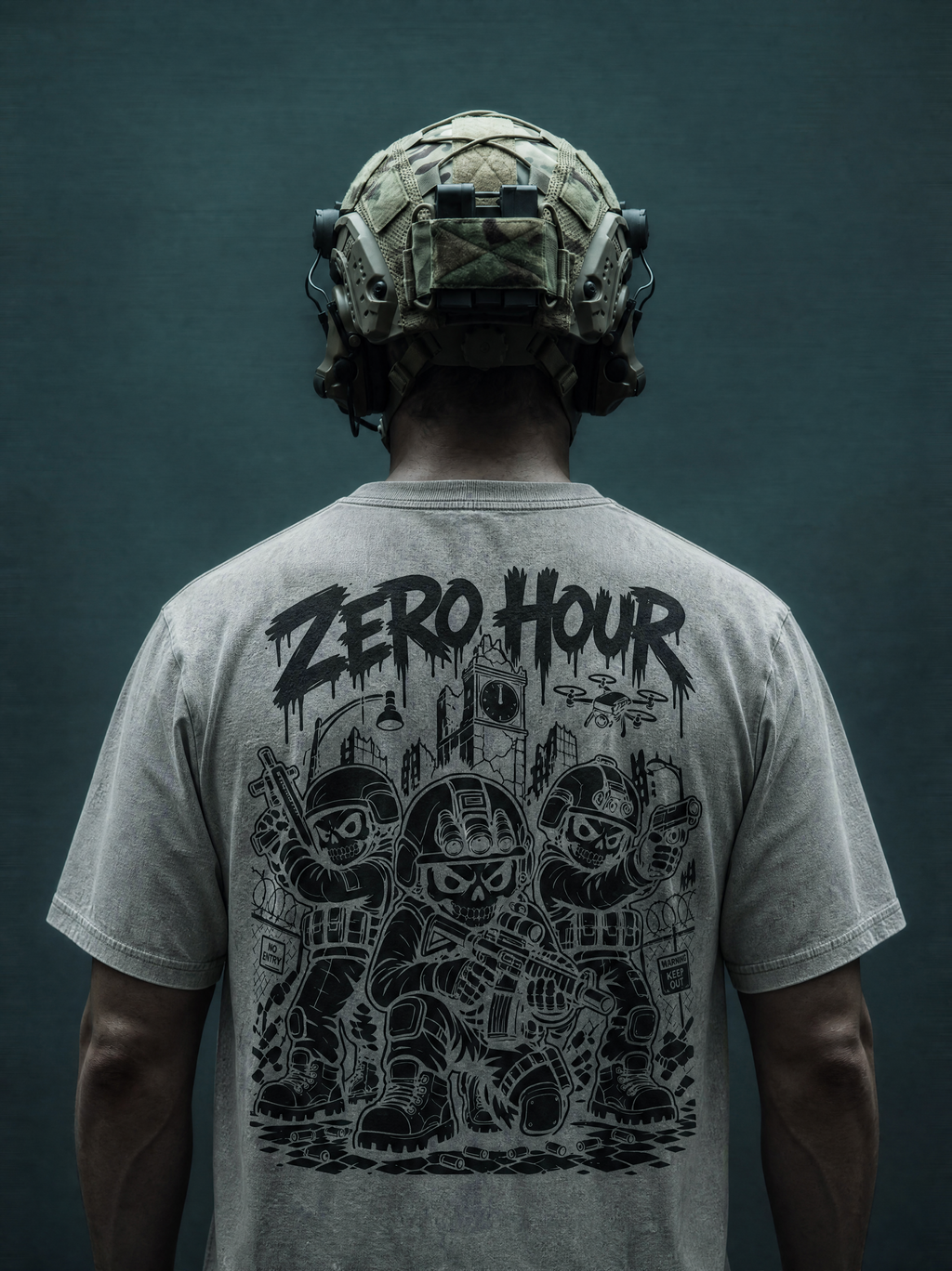 Person wearing a helmet and gray t-shirt with 'Zero Hour' graphic design on a dark background