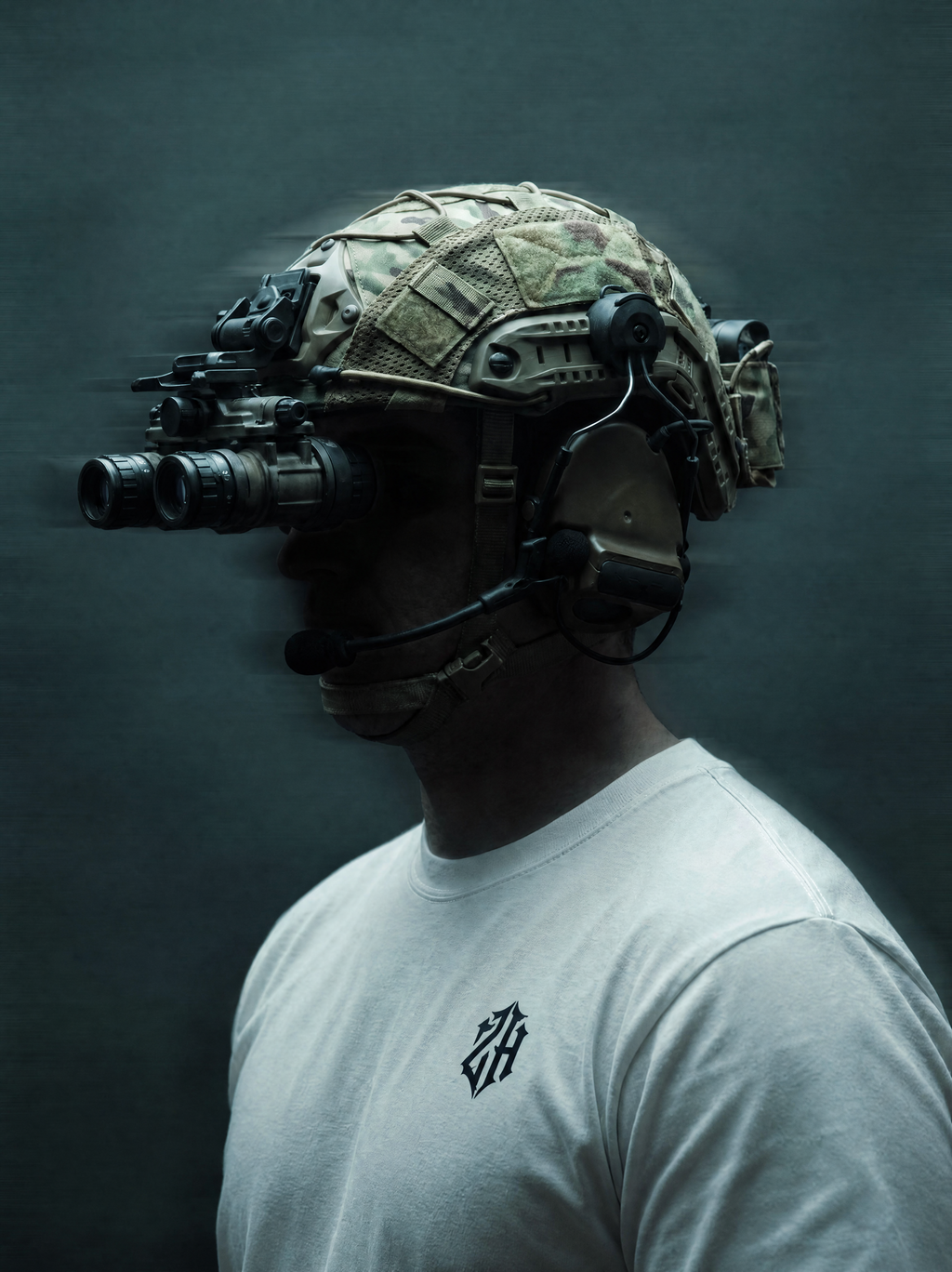 Person wearing a tactical helmet with various devices on a dark background