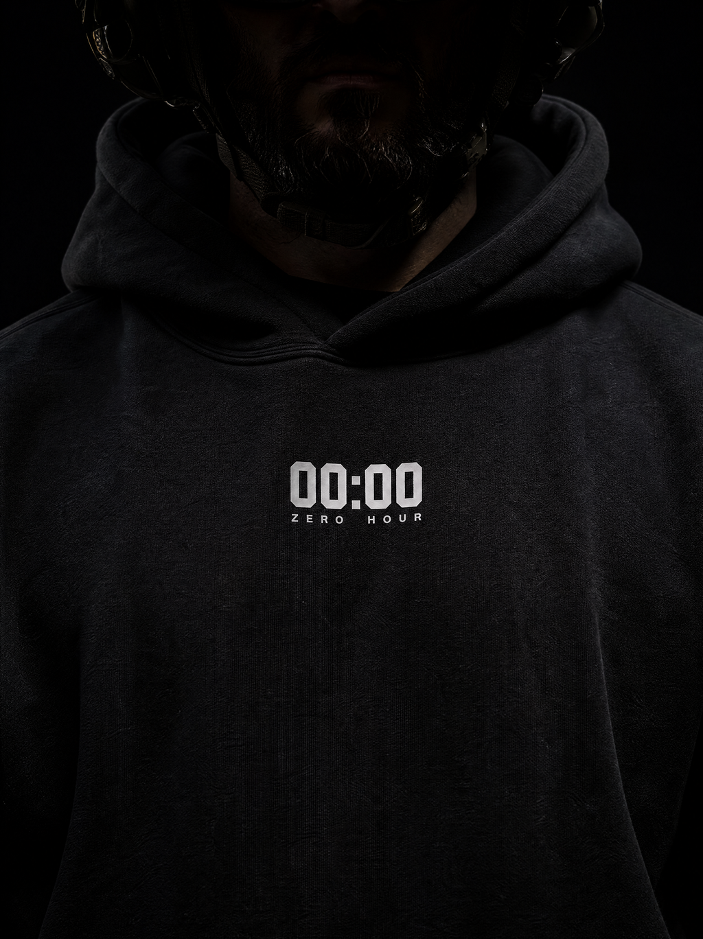 Dark hoodie with '00:00 ZERO HOUR' text on a black background