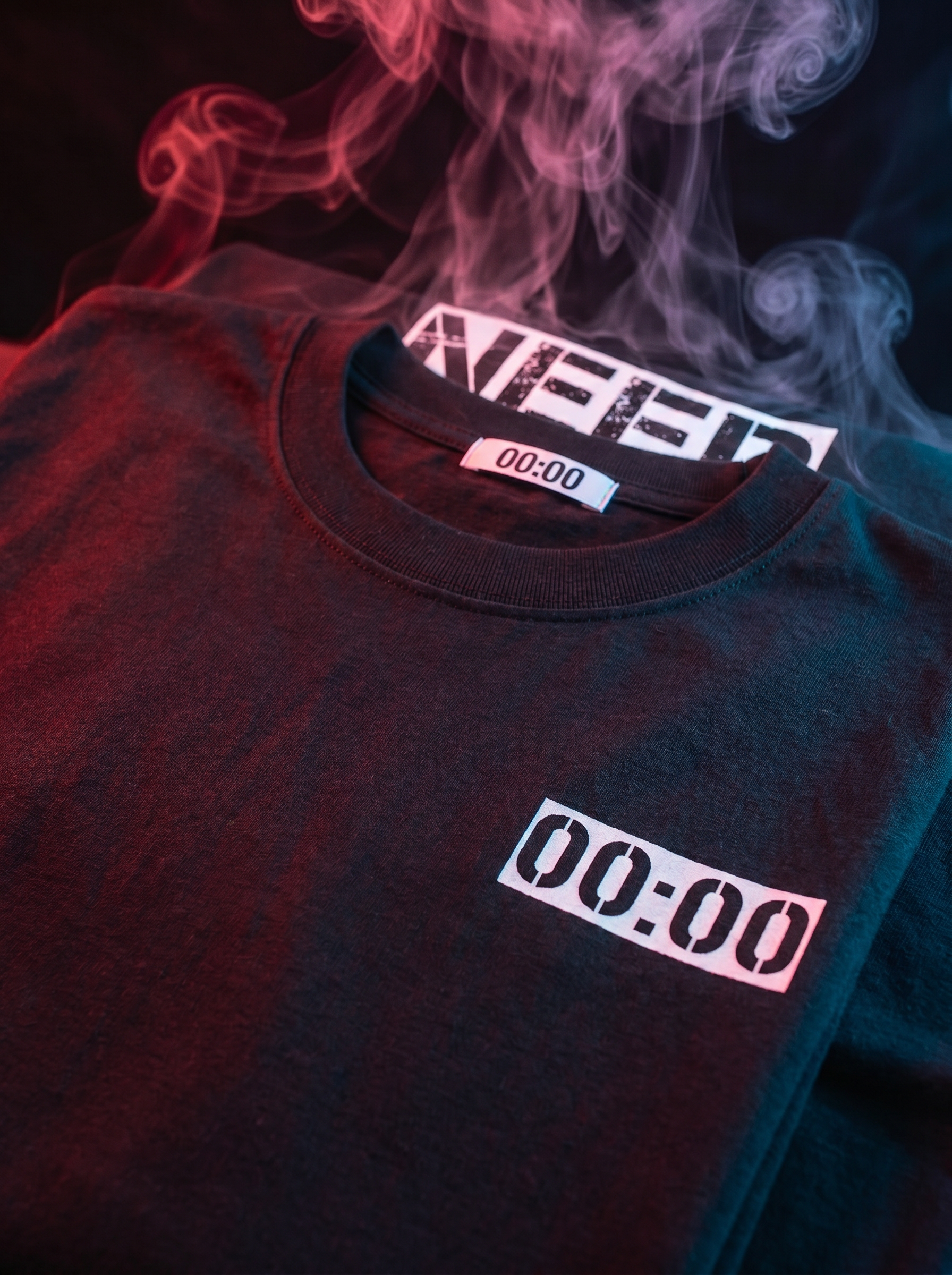 Black t-shirt with '00:00' text, surrounded by colorful smoke.