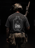 Person wearing a tactical outfit with 'Only Drills' logo on a dark background