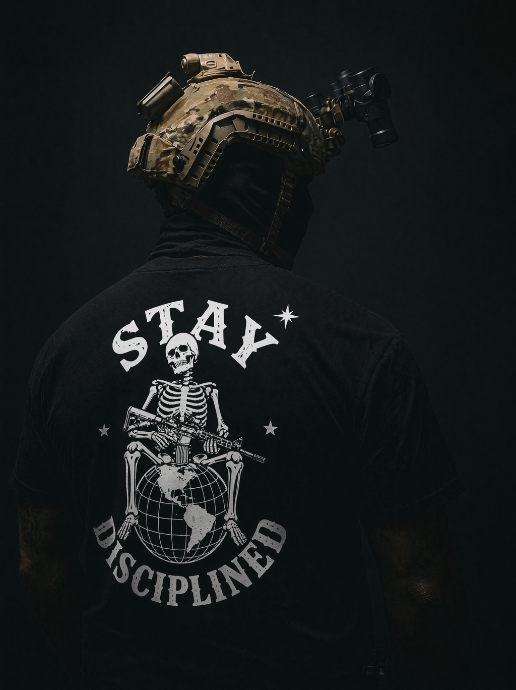 Person wearing a tactical helmet with a 'Stay Disciplined' skeleton graphic on a dark background